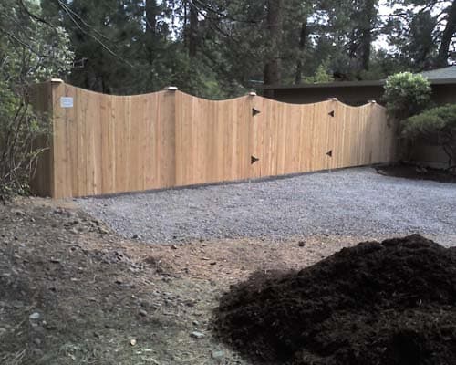 Custom shaped cedar fence