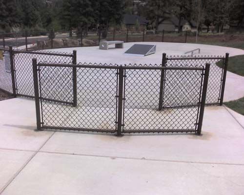 Chain link divider at skate park