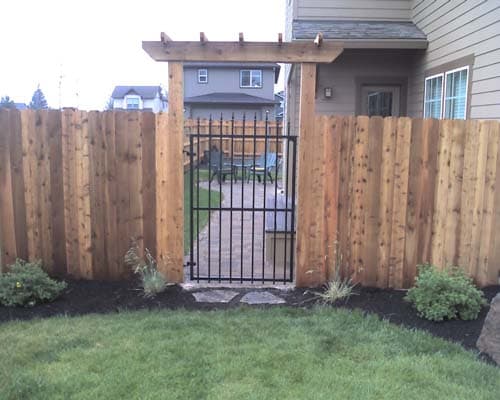 Cedar fence and arbor with metal gate