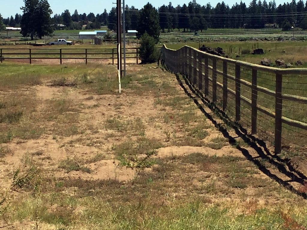 Photo of ranch style fence pole construction.