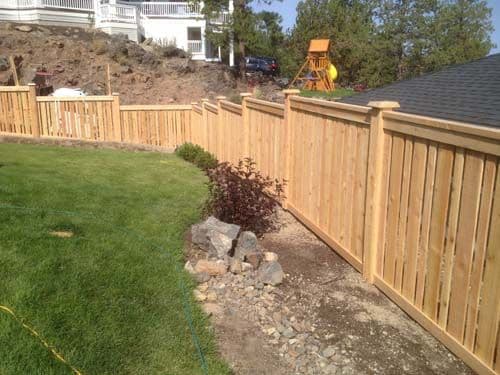 Backyard cedar property divide fence
