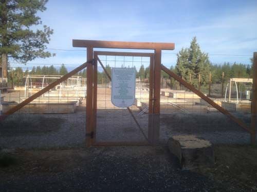 Photo of deer fencing with garden gate.