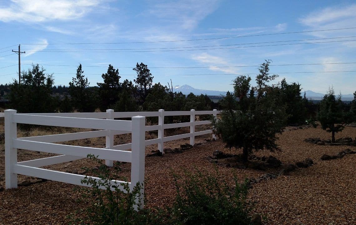 Scenic photo with vinyl ranch style fencing